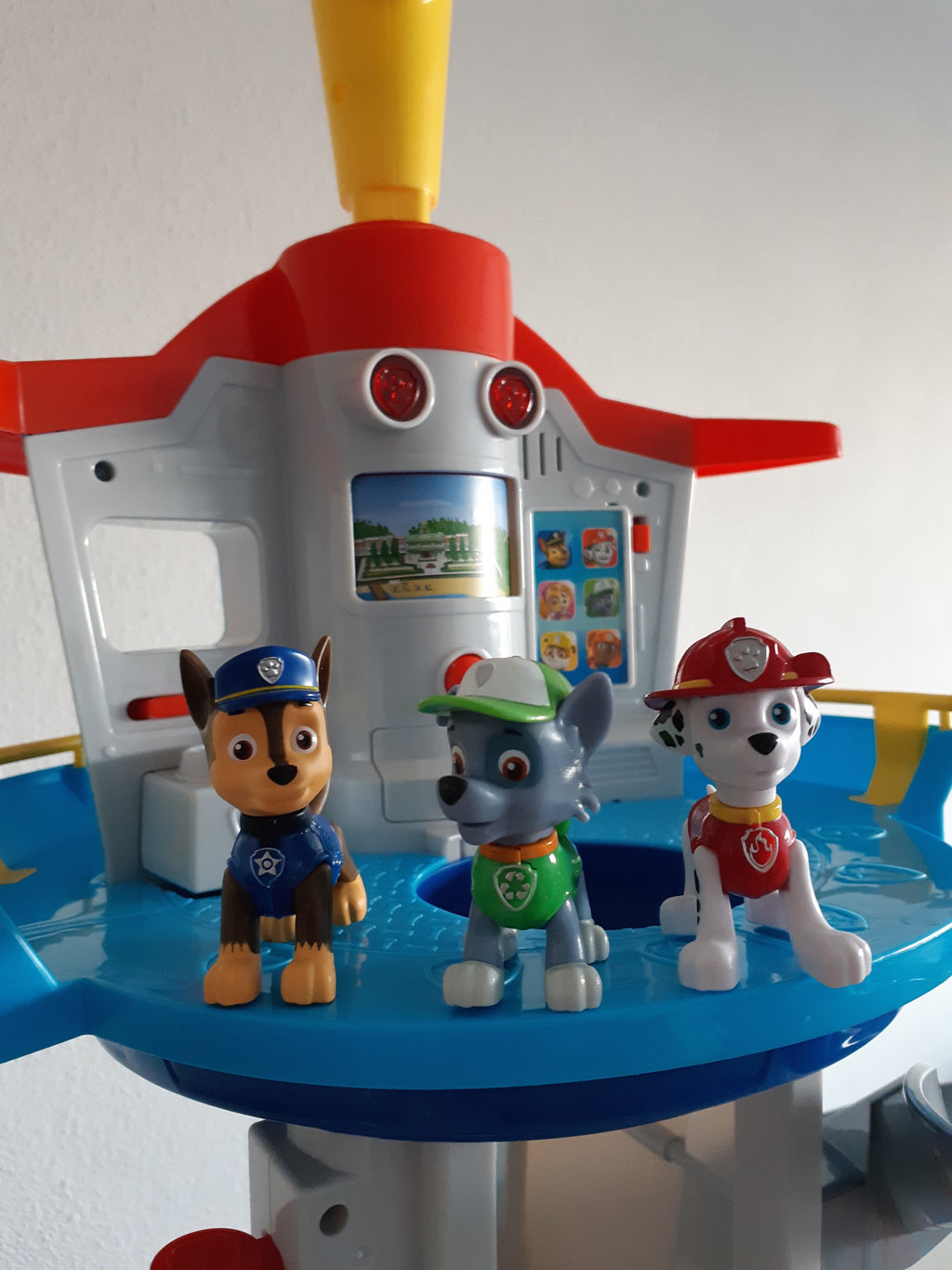 Adventure play tower with slide and racetrack