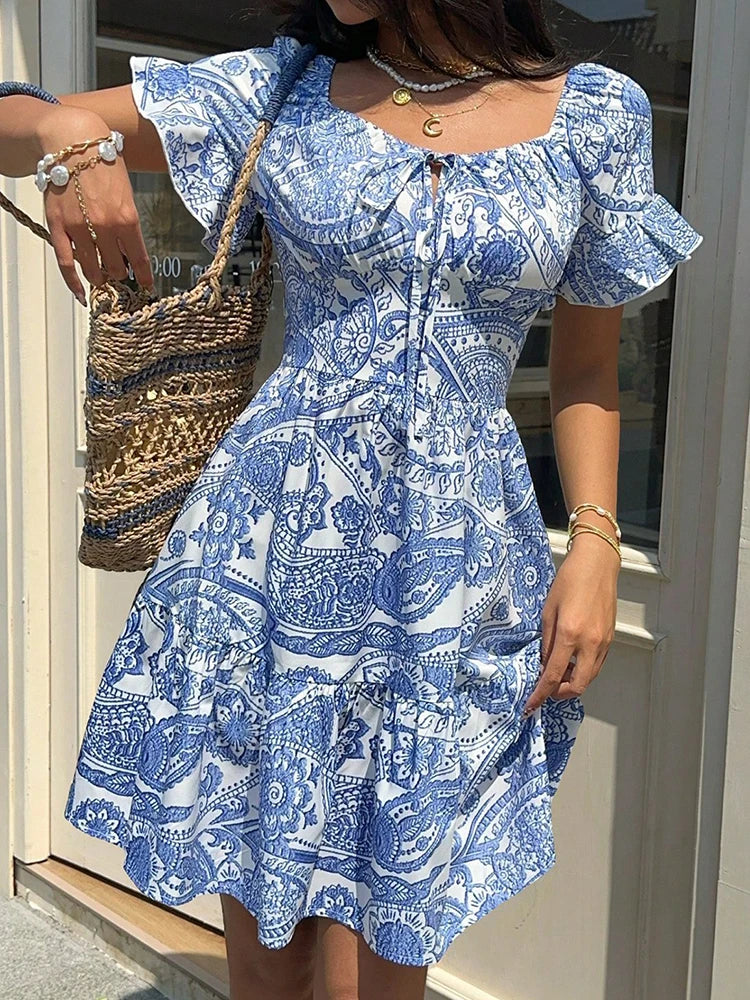 Sweet Printed Short Sleeved Beach Dress New Summer Vacation High Waisted Casual Dress 2026 Fashion Lace Up Pleated Party Dress