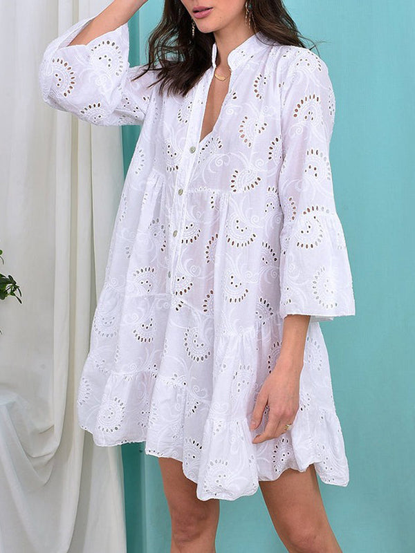A-line mini dress with V-neck, trumpet sleeves, and button accent