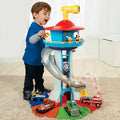 Adventure play tower with slide and racetrack
